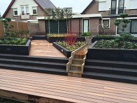 Diagonaal tuinontwerp met cortenstaal watergoot